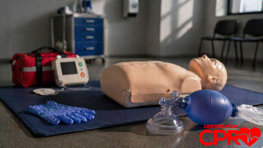 CPR training manikin with AED and rescue mask for certification in Boston.