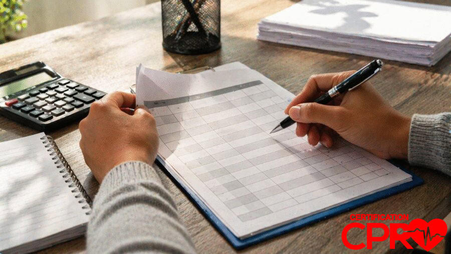 Person filling out a form for CPR certification in Boston, Massachusetts.